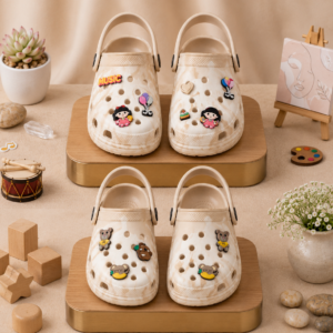 Make every step magical with these adorable kids’ EVA clogs designed for comfort, style, and fun. Featuring cute cartoon charms, a lightweight cushioned sole, and breathable ventilation holes, these clogs keep little feet happy all day long. Perfect for playtime, casual outings, travel, and daily wear with an easy slip-on design kids love. Why Choose These Crocs? Cute cartoon charms kids love Lightweight EVA material for soft comfort Breathable ventilation holes for airy feel Adjustable back strap for secure fit Anti-slip sole for safe walking Easy slip-on style for everyday use Waterproof and quick-drying design Perfect for indoor, outdoor, and playtime wear Fun colorful look that matches every outfit Durable and easy to clean for daily adventures Specifications Material: Soft EVA Foam Sole Type: Anti-Slip Sole Closure Type: Slip-On with Back Strap Fit Type: Comfortable Regular Fit Design: Cartoon Charm Ventilation Design Weight: Ultra Lightweight Gender: Kids Usage: Indoor & Outdoor Wear Water Resistance: Yes Colors: Multi-Color Pastel Shades Care: Easy Wash & Quick Dry Style: Casual Kids Comfort Clogs Size Guide (Indian Sizing) India Size EU Size Foot Length (Approx.) 36 36 23 cm 37 37 23.5 cm 38 38 24 cm 39 39 24.5 cm Perfect For Every Occasion From playtime at home to fun outdoor adventures, these cute cartoon clogs are perfect for every moment. Ideal for school, park visits, travel, beach days, casual outings, and daily wear, they keep little feet stylish, comfortable, and happy all day long. Care Instructions Wash gently with mild soap and water Avoid direct heat or strong sunlight Air dry naturally after cleaning Do not use bleach or harsh chemicals Store in a cool and dry place Clean cartoon charms carefully for long-lasting shine DISNEY PRINCESS SLING BACK CLOGS – FOR GIRLS (COMBO)